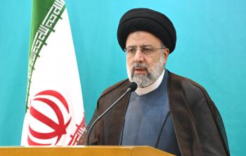 الرئيس الإيراني مع الجالية.jpg